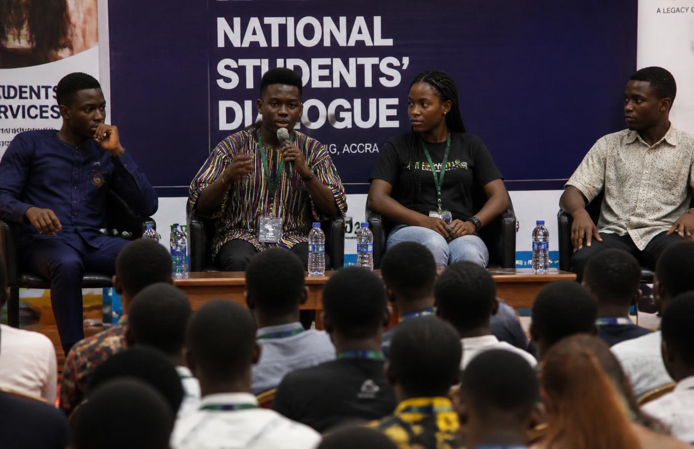 Panel of students speaking at a student dialogue forum